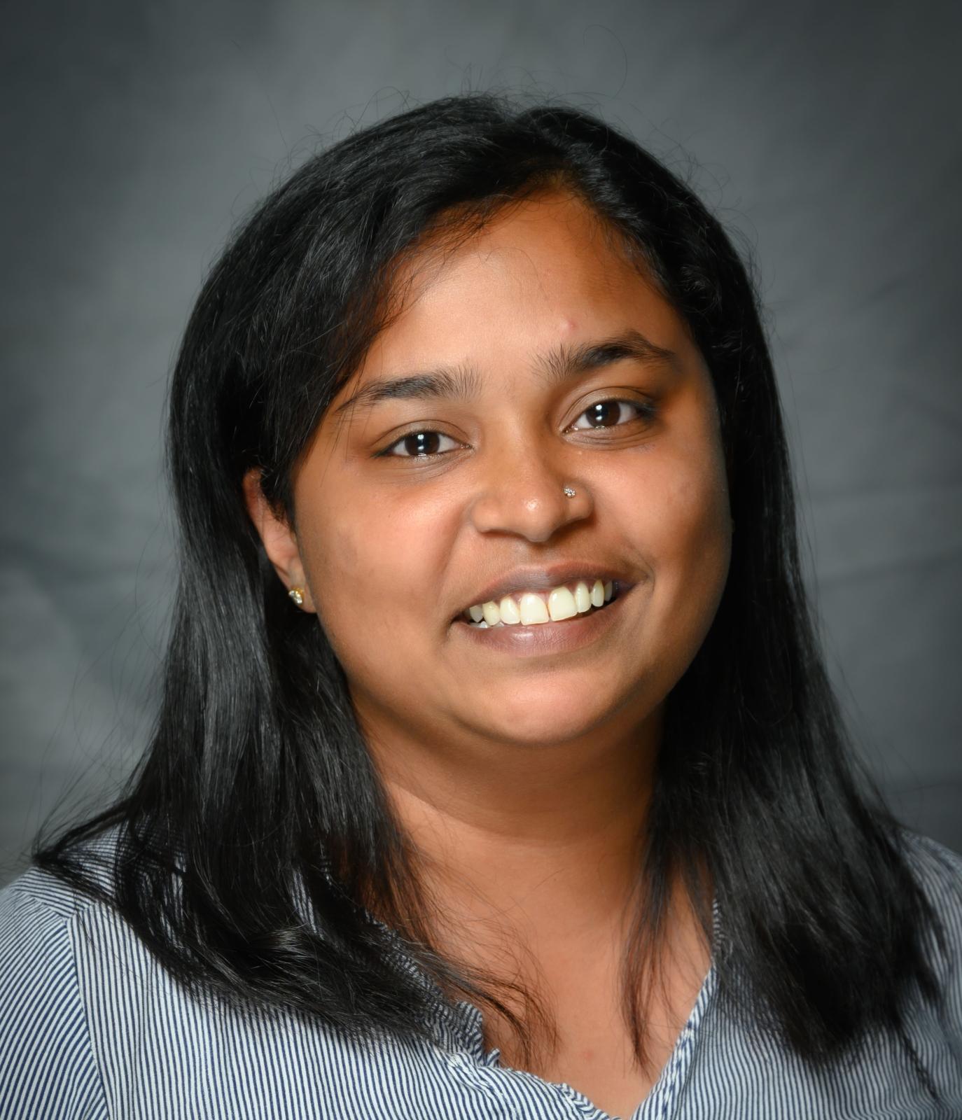 a headshot photo of Divya Rose, a PhD candidate in veterinary biomedical science with a concentration in infectious disease within the College of Veterinary Medicine and stationed at the Thad Cochran National Warmwater Aquaculture Center